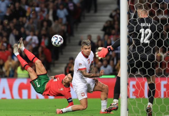 1731713931938028419.png 开云体育官网-C罗梅开二度 5比1狂胜波兰 葡萄牙小组第一出线!